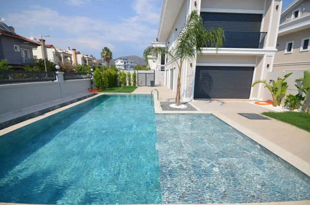 Изображение Стильная новая вилла 4+1 с бассейном в Фетхие